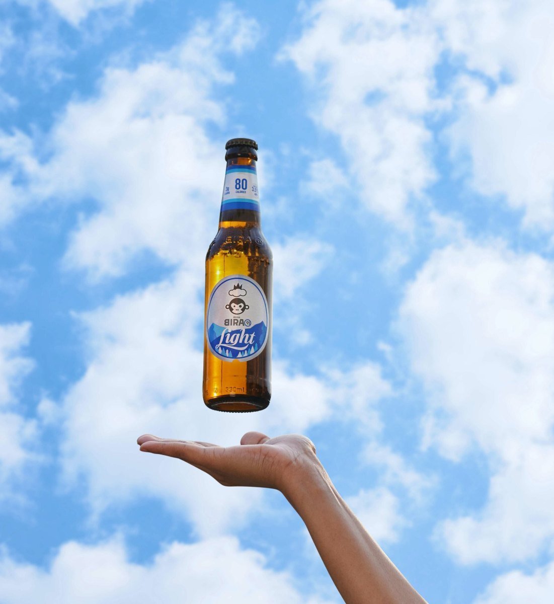 Mascot sailing on a cloud
