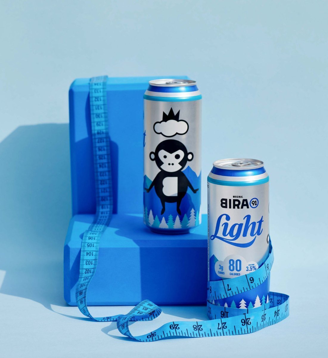 Bira 91 Light cans with yoga mat and dumbbells
