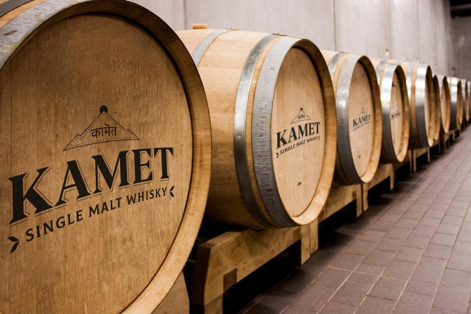 Kamet-branded casks lined up in the maturation hall