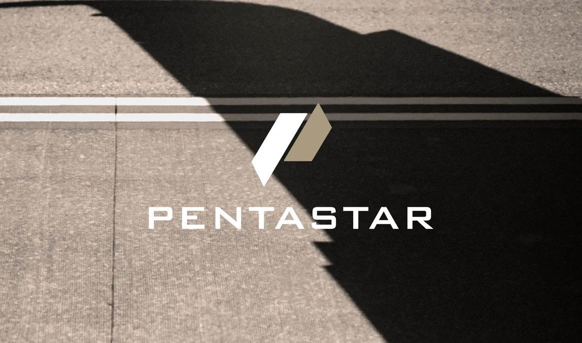 Pentastar mark on tarmac in warm shadow